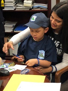 Everett Police Department Donation to 5-year-old Sergio Ivan Gill