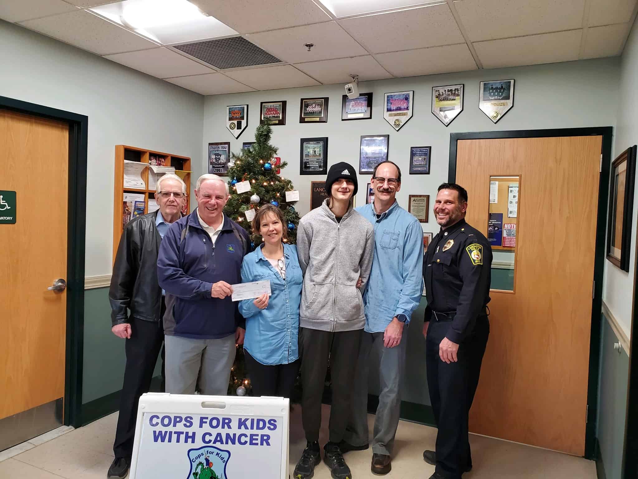 CFKWC went to Lancaster Police Department to make a donation to 16 year old Nathan Poch and his family.
