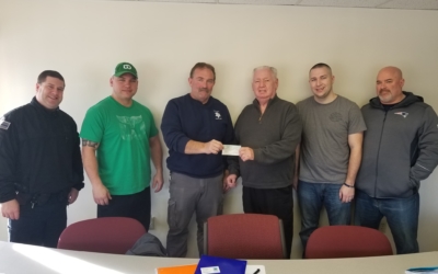 CFKWC Accepts Donation from the Essex County Correctional Officers Association.