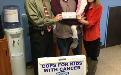 CFKWC went to the State Police barracks in Leominster to present a check for $5,000 to parents for their 2 year old daughter