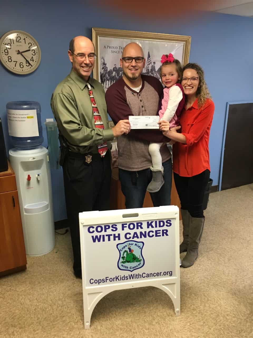 CFKWC went to the State Police barracks in Leominster to present a check for $5,000 to parents for their 2 year old daughter