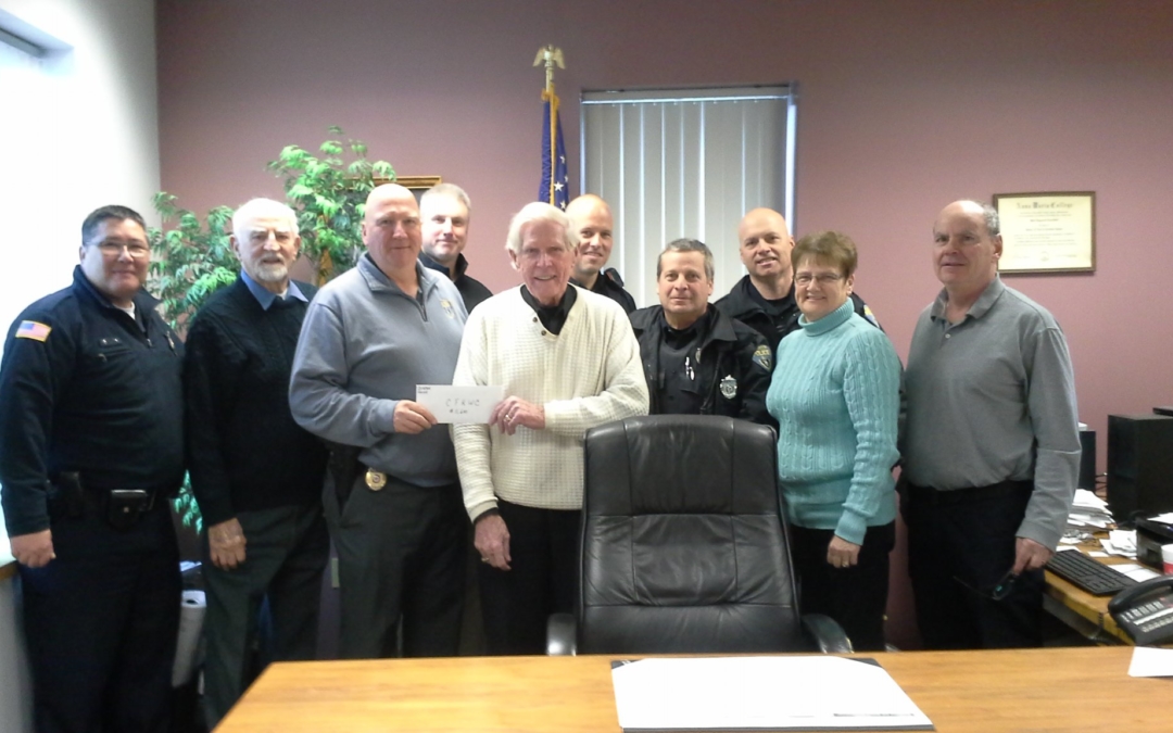 CFKWC goes to Clinton PD to accept $11,600 donation from department from golf tournament