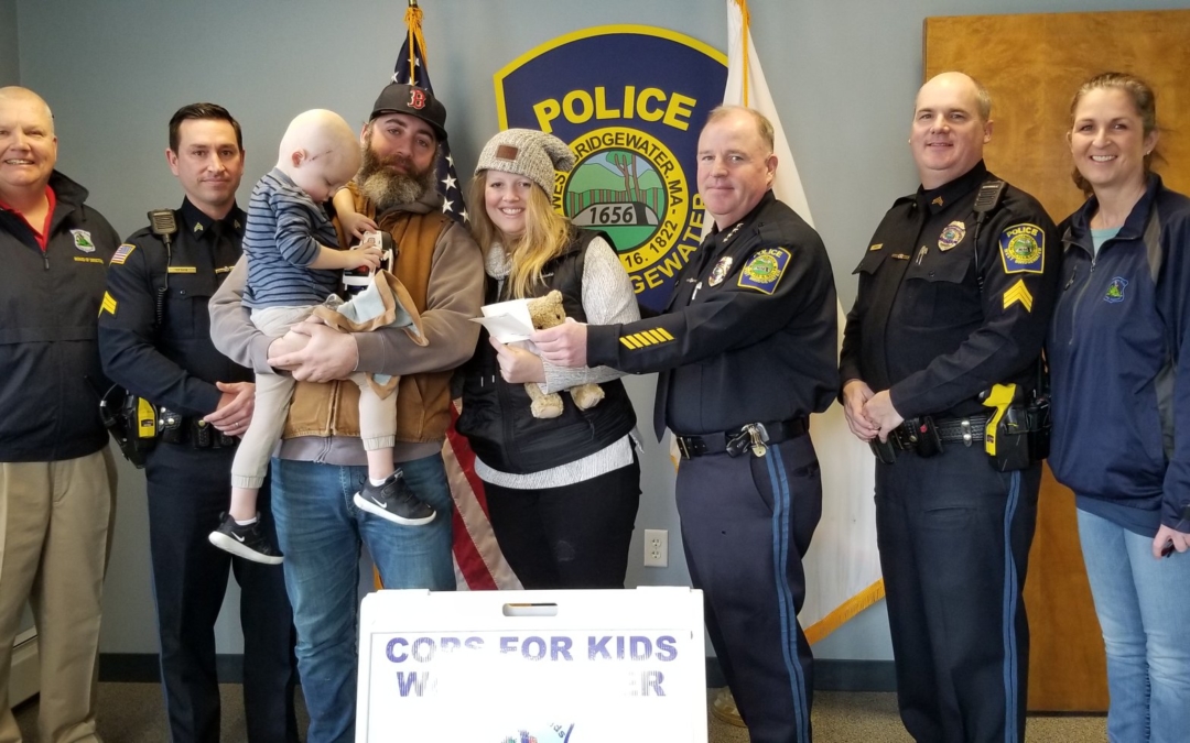 CFKWC and West Bridgewater PD make donation to Jase Russell age 3 yrs., and his parents