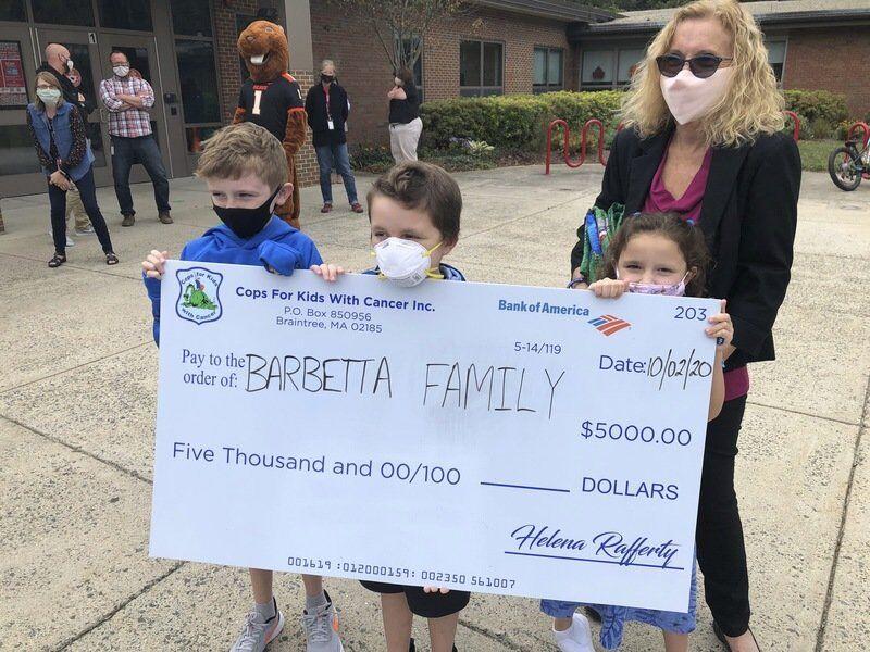 Barbetta Family Accepts $5,000 Check From CFKWC in Beverly