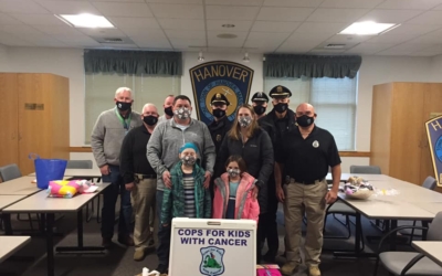 Check donation made to 8 year old Caiya with the Hanover PD
