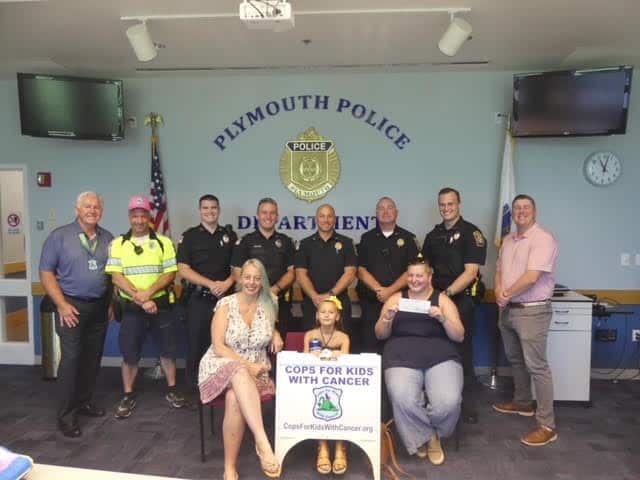 CFKWC makes donation at the Plymouth Police Department to 20 year old Hannah