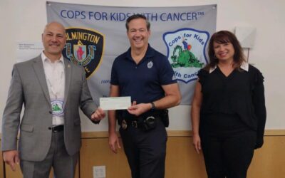 CFKWC accepts check donation of $3,200 from the men and women of the Wilmington Police Department