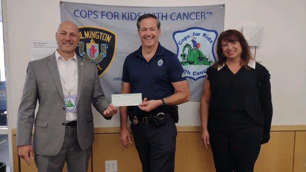 CFKWC accepts check donation of $3,200 from the men and women of the Wilmington Police Department