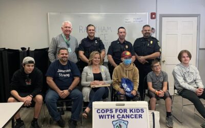 Raynham Police Department make a donation to 15 year old Jameson Marrone