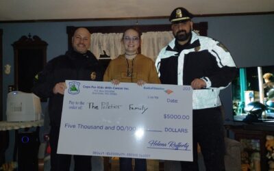 Sgt. Sal Mirabella & Lt. Hannagan, CFKWC, made a donation to 19 month old Onyx Pelletier
