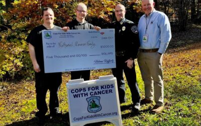 Kevin Calnan of CFKWC made a donation at the Warren, Mass. Police Department to Nathaniel Rimmer and family