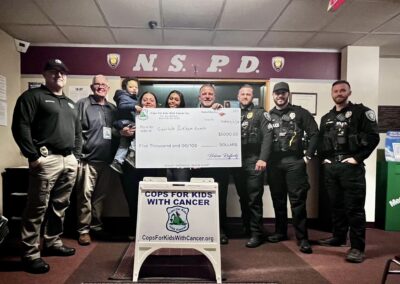 CFKWC made a donation to the Peckham family atthe North Smithfield Police Department, (RI)
