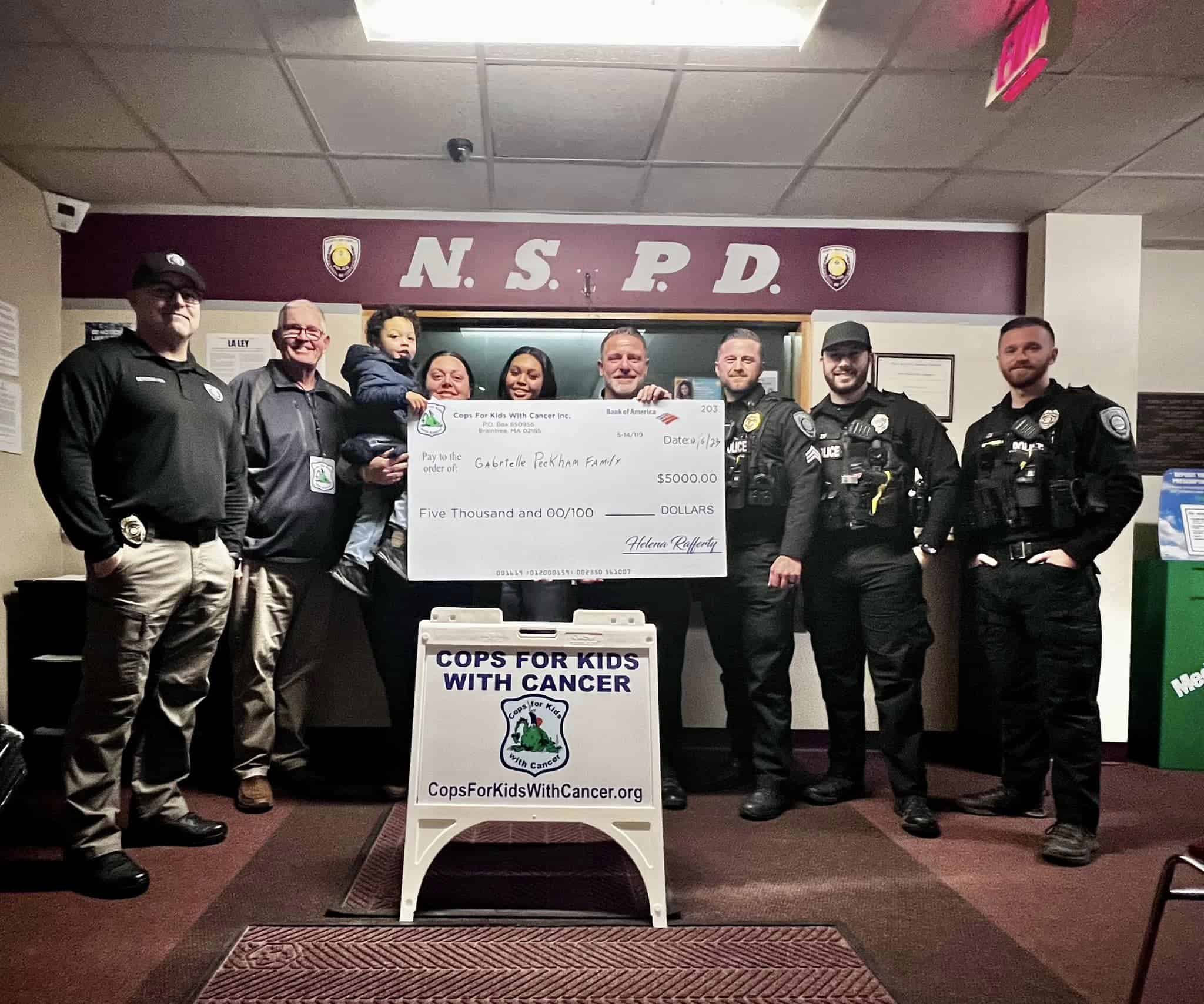 CFKWC made a donation to the Peckham family atthe North Smithfield Police Department, (RI)