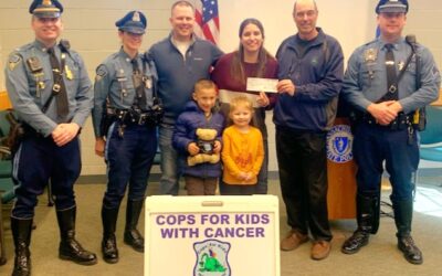 Mike Drummy CFKWC made a donation to Ava and the Blazis family at the Millbury, Mass State Police Barracks