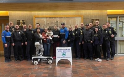 Cops for Kids with Cancer presented the Perez family of Somerville with a $5,000 check
