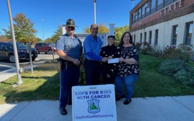 Cops for Kids Presents $5,500 Check to Cynthia Capillo at the State Police Barracks in Sturbridge