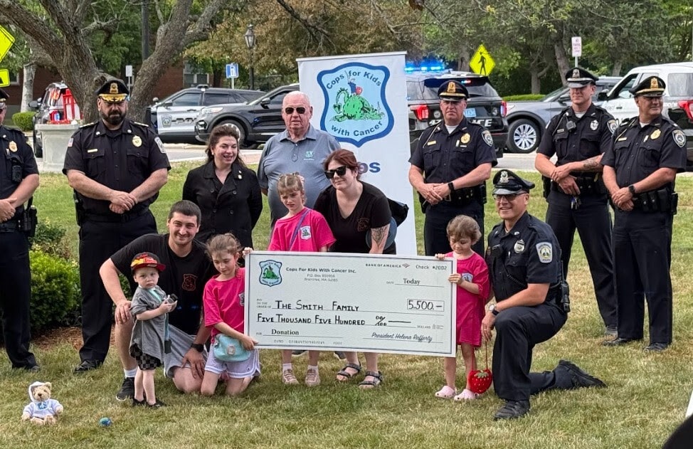 The Smith Family receiving their check from CFKWC.