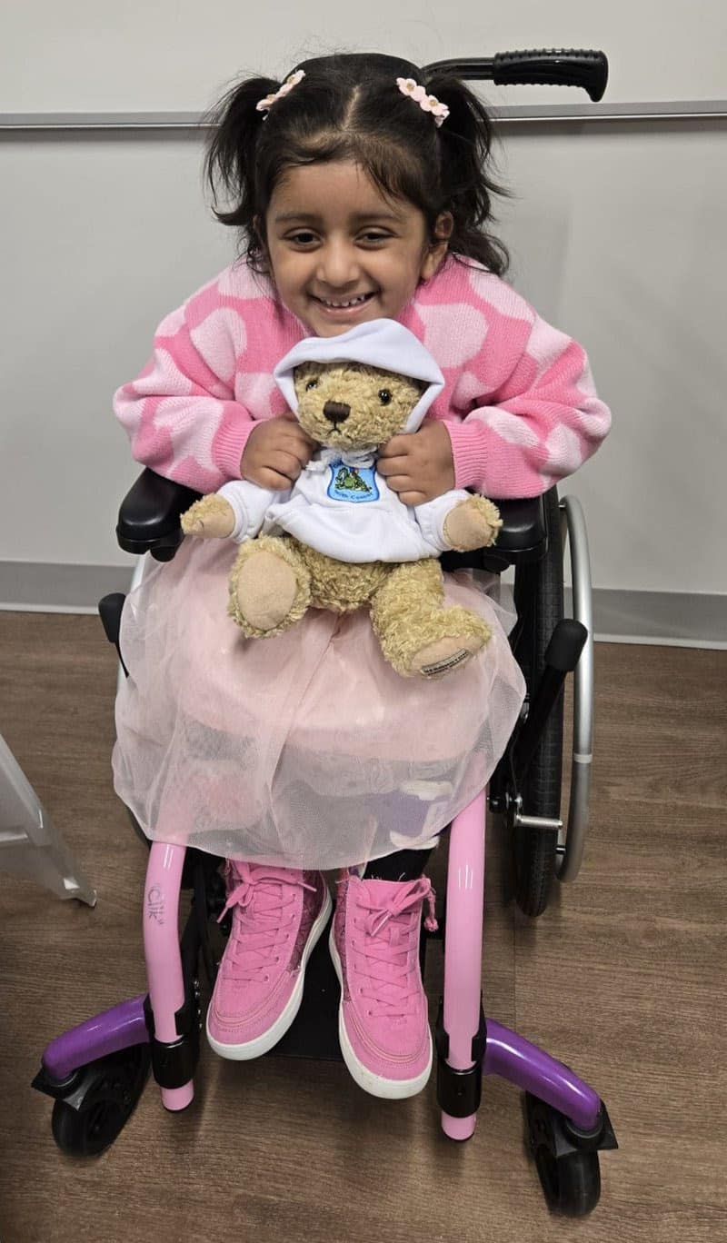 Cops for Kids with Cancer and Burlington Police stood behind Zoya Bilimoria, of Burlington, this week as they presented Zoya and her family with a ,500 check to support them as Zoya battles metastatic pineoblastoma, a rare and aggressive form of brain cancer.